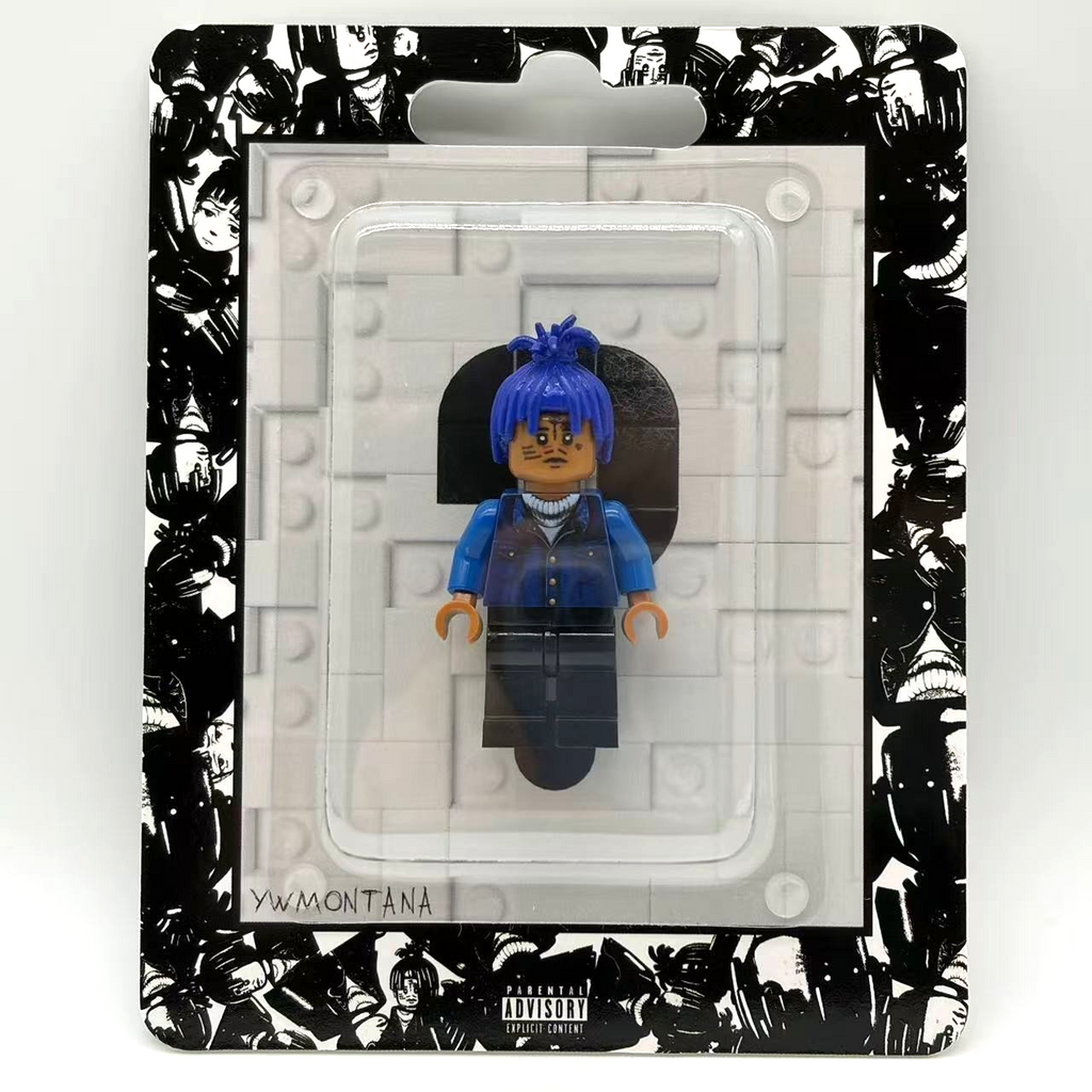 XXXTentacion custom minifigure with blue hair, detailed facial tattoos, in a black and white themed blister pack.