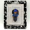 XXXTentacion custom minifigure with blue hair, detailed facial tattoos, in a black and white themed blister pack.