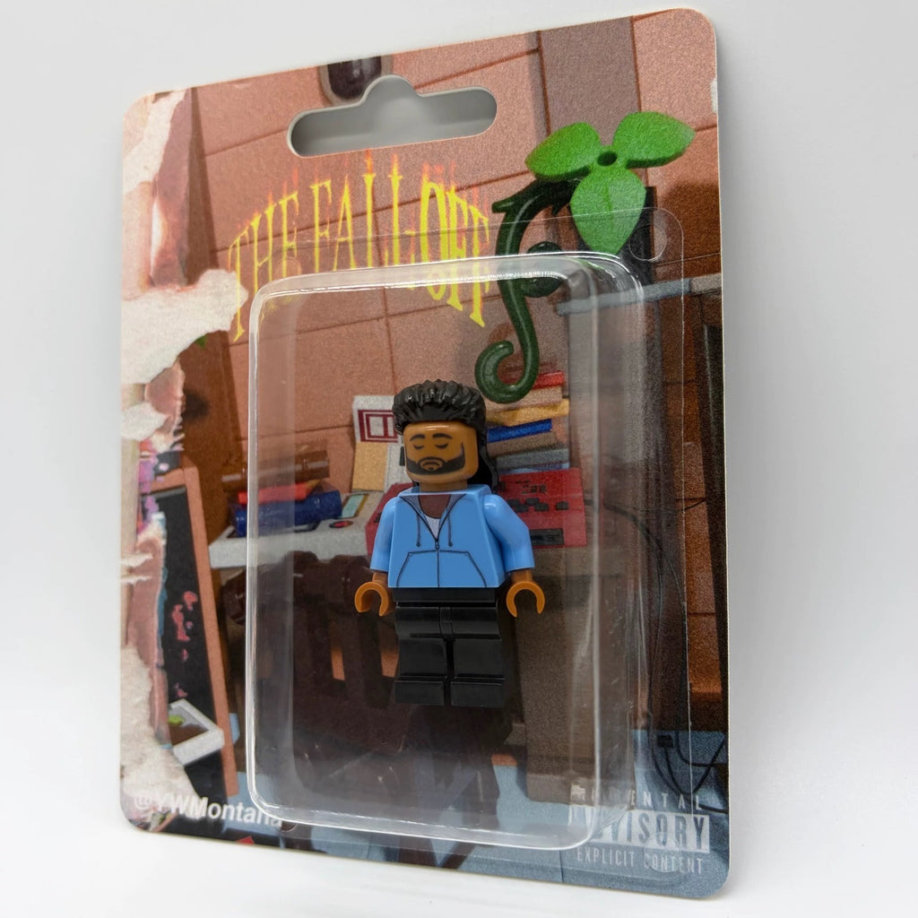 J. Cole custom minifigure in blue hoodie, black pants, displayed in "The Fall Off" themed packaging.