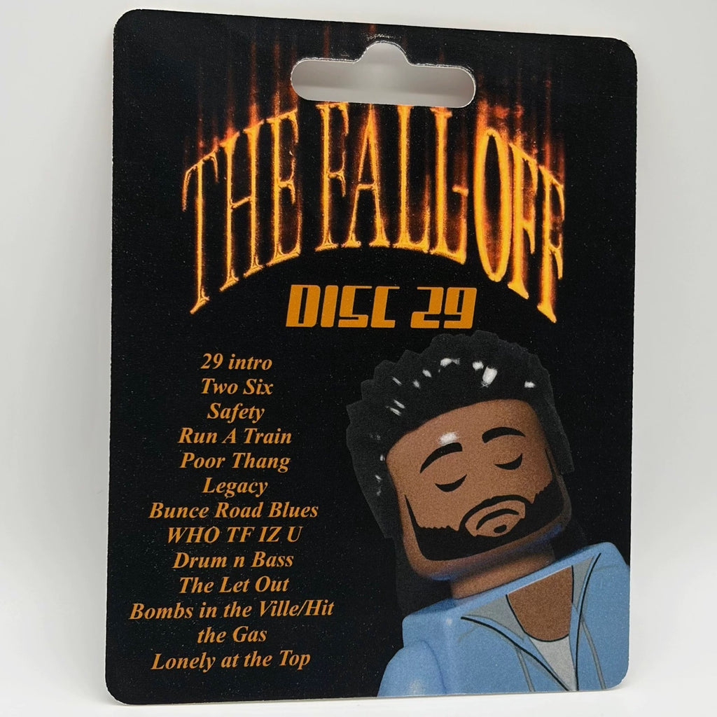 J. Cole "The Fall Off" custom minifigure on black card with album art and tracklist.