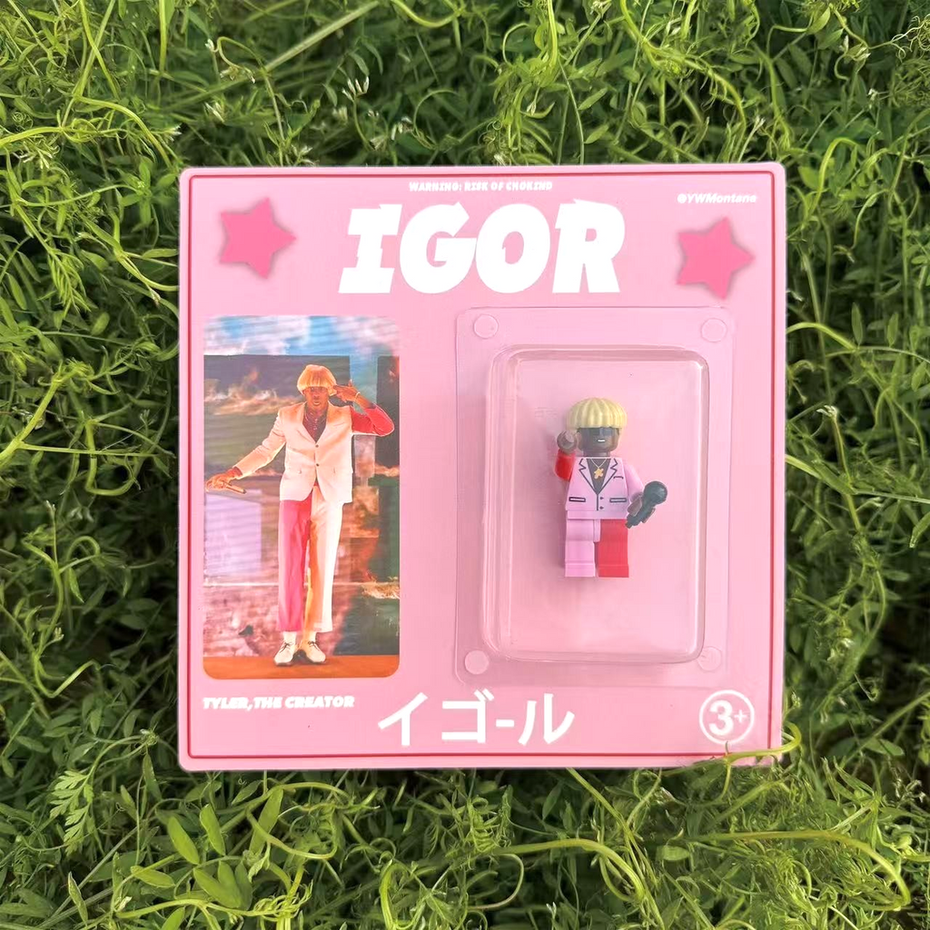 Tyler The Creator IGOR custom minifigure in pink packaging with blonde bob hair and split color suit.