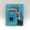Tyler The Creator Cherry Bomb Custom Minifigure with pink mask and blue patterned shirt in blister pack.