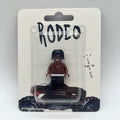 Travis Scott Rodeo Custom Minifigure in blister pack; brown minifigure with printed details and packaging design.
