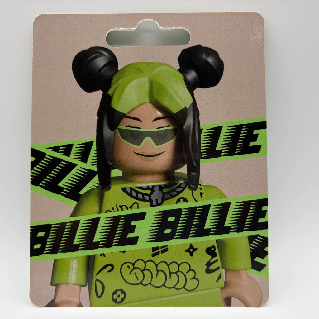 Billie Eilish custom minifigure toy featuring neon green and black hair, streetwear outfit, and sunglasses.