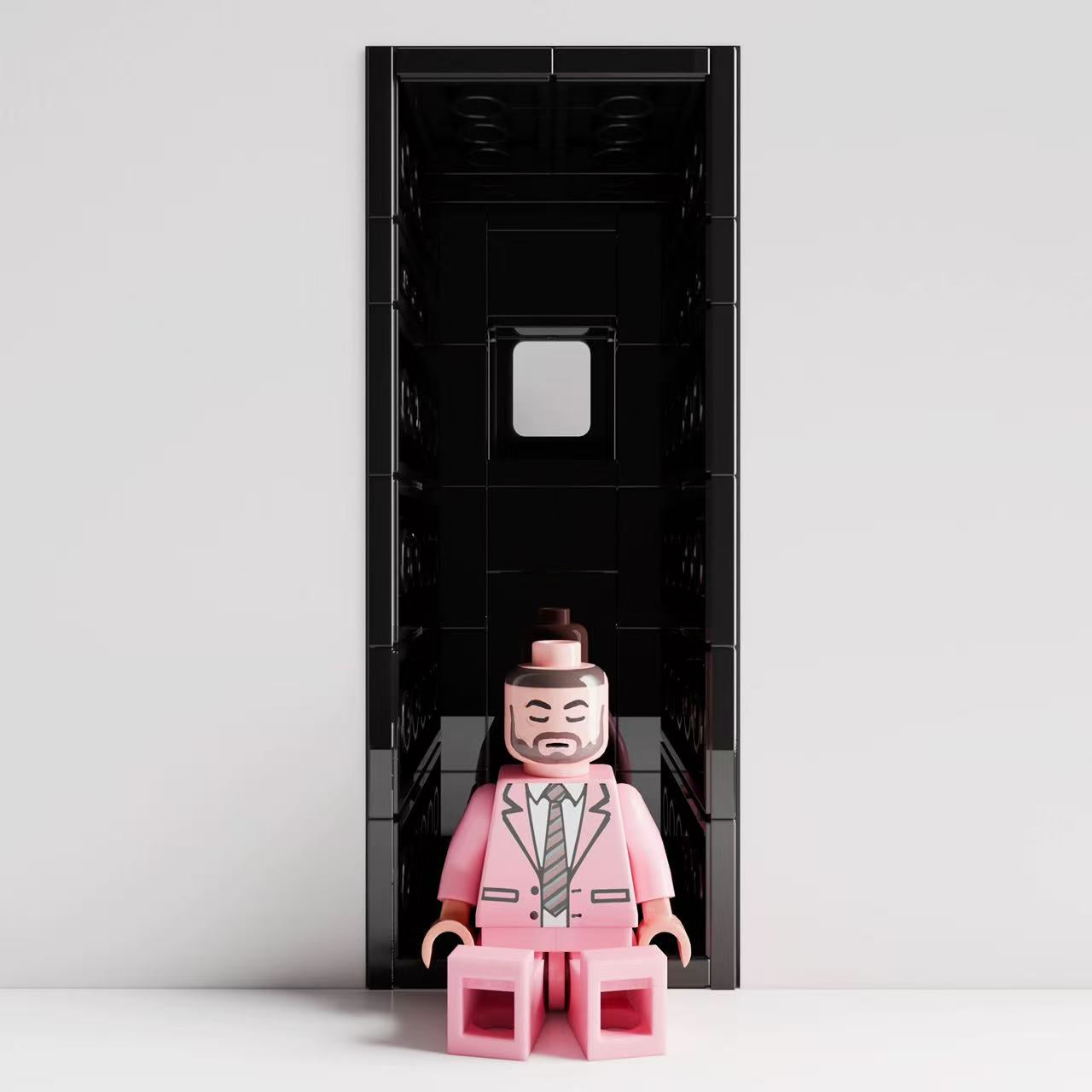 Mac Miller "Swimming" custom minifigure in a pink suit, featuring detailed facial print, sitting position.