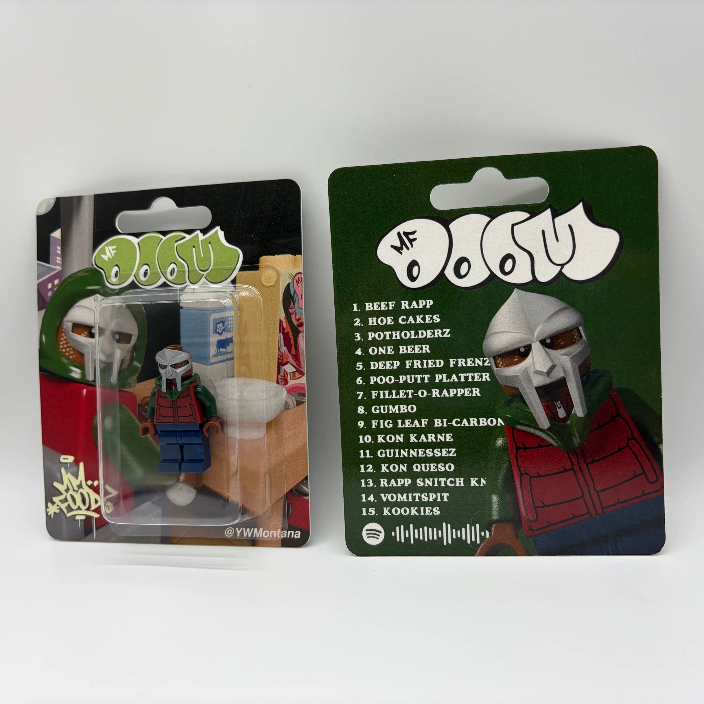 MF DOOM "MM...FOOD" custom minifigure in blister pack, featuring metallic mask and colorful hooded outfit.