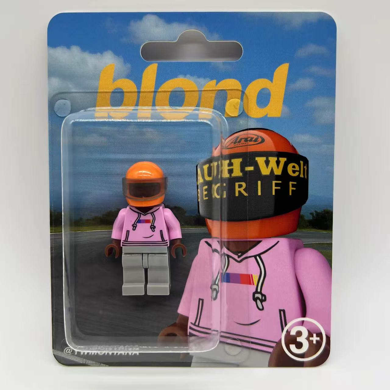 Frank Ocean "Blond" custom minifigure with pink hoodie, orange helmet, in collector-grade blister pack.